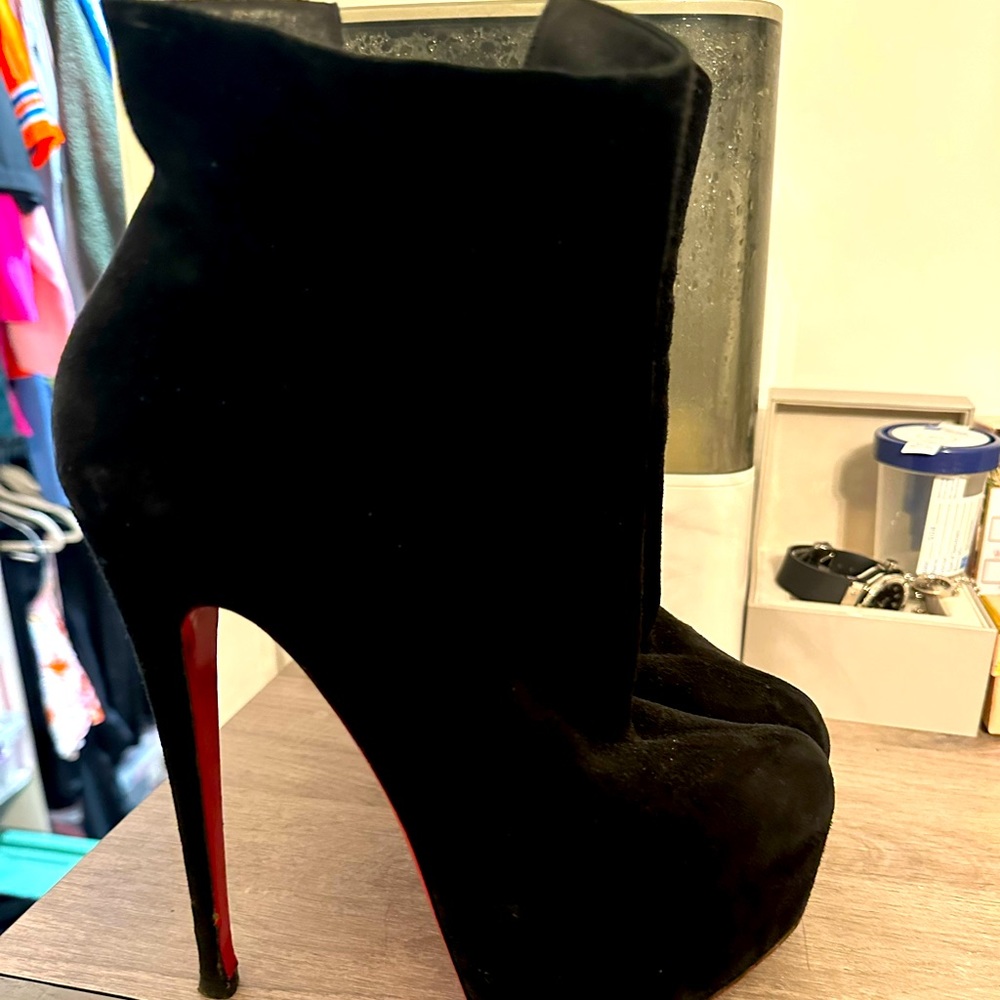 Black Christian louboutin booties gently used